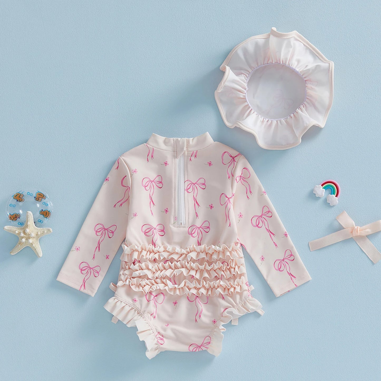 Maillot de bain pour bébé fille, protection contre les éruptions cutanées, imprimé nœud, à volants, manches longues, col rond, vêtements de plage, combinaison et chapeau, ensemble 2 pièces
