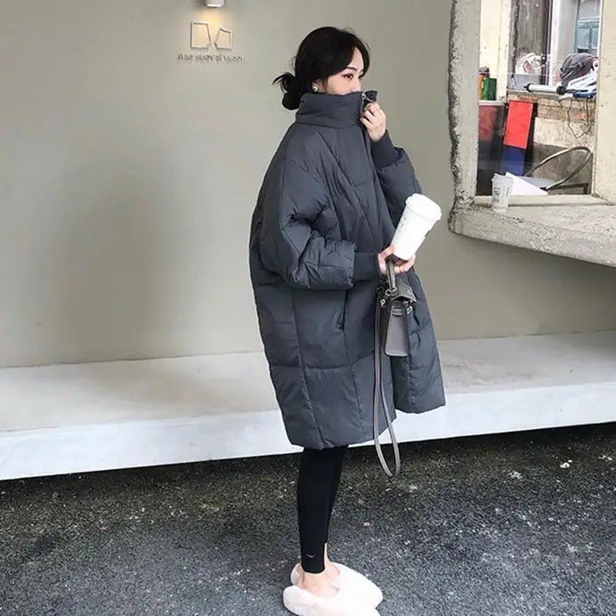 Abrigo de invierno de algodón casual para mujer, ajuste holgado coreano, longitud media, estilo Hong Kong, ropa exterior de moda