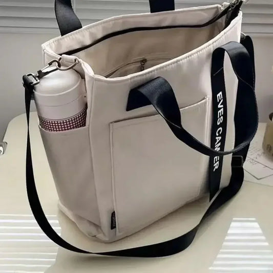 Nuevo bolso de mano informal de gran capacidad de nailon impermeable, bolso de lona, bolsos de mensajero de moda simple para colegiala