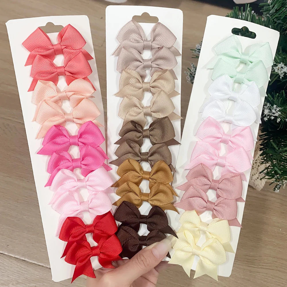 Pinces à cheveux avec nœuds pour enfants, couleur unie, pour bébés filles, ruban fait à la main, épingle à cheveux, Barrettes, accessoires pour cheveux du nouvel an, 10 pièces/ensemble