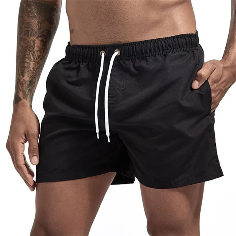 Maillot de bain pour hommes avec doublure en maille poches latérales short de plage solide séchage rapide léger cordon de serrage short de bain maillot de bain d'été