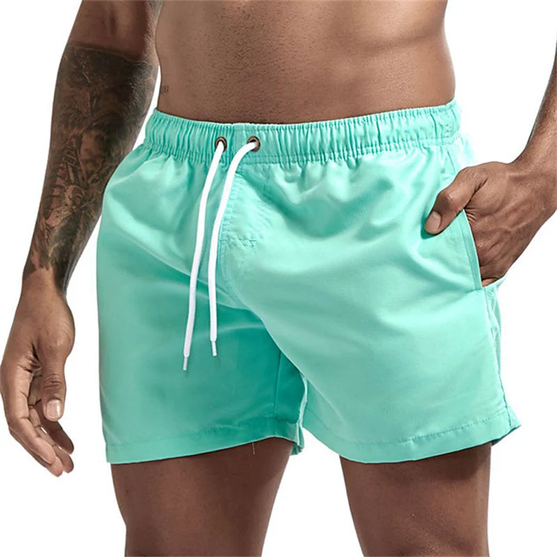 Maillot de bain pour hommes avec doublure en maille poches latérales short de plage solide séchage rapide léger cordon de serrage short de bain maillot de bain d'été