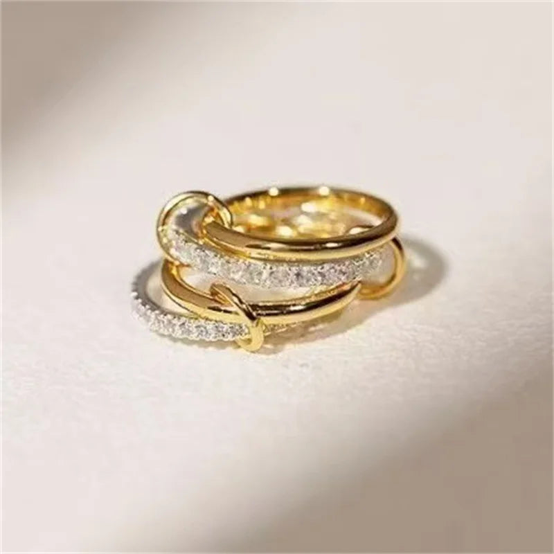 Une Niche bague de bijoux en cuivre bicolore à quatre anneaux, hypoallergénique, Style Ins, artefact empilable, adapté aux bijoux pour jeunes femmes