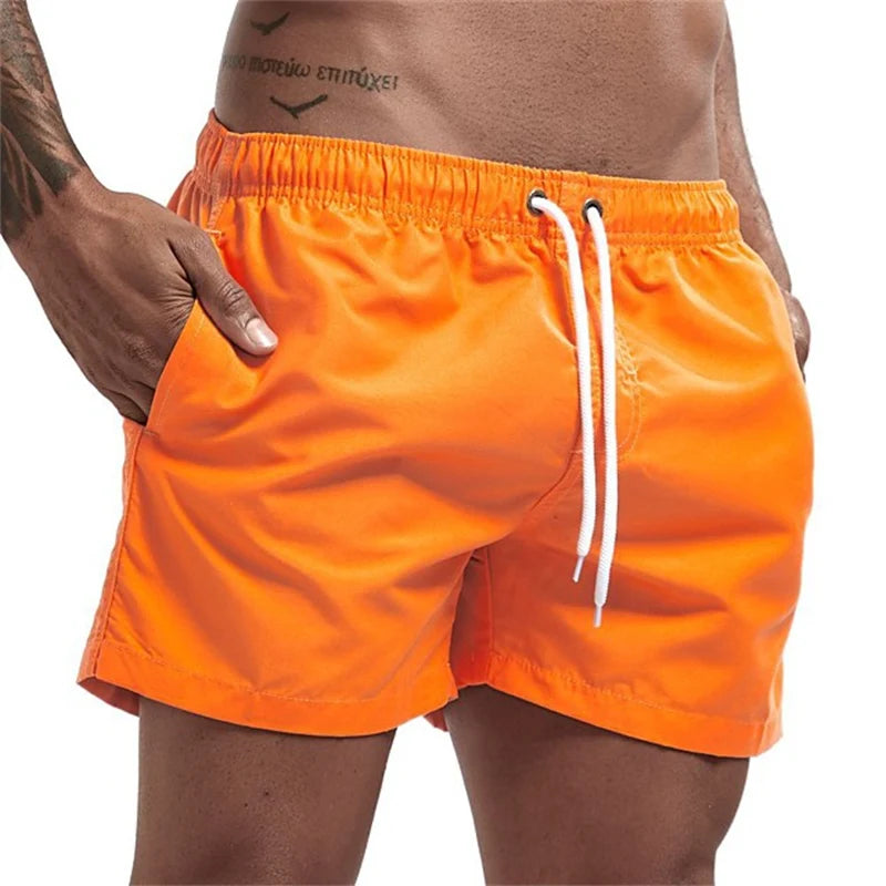 Maillot de bain pour hommes avec doublure en maille poches latérales short de plage solide séchage rapide léger cordon de serrage short de bain maillot de bain d'été
