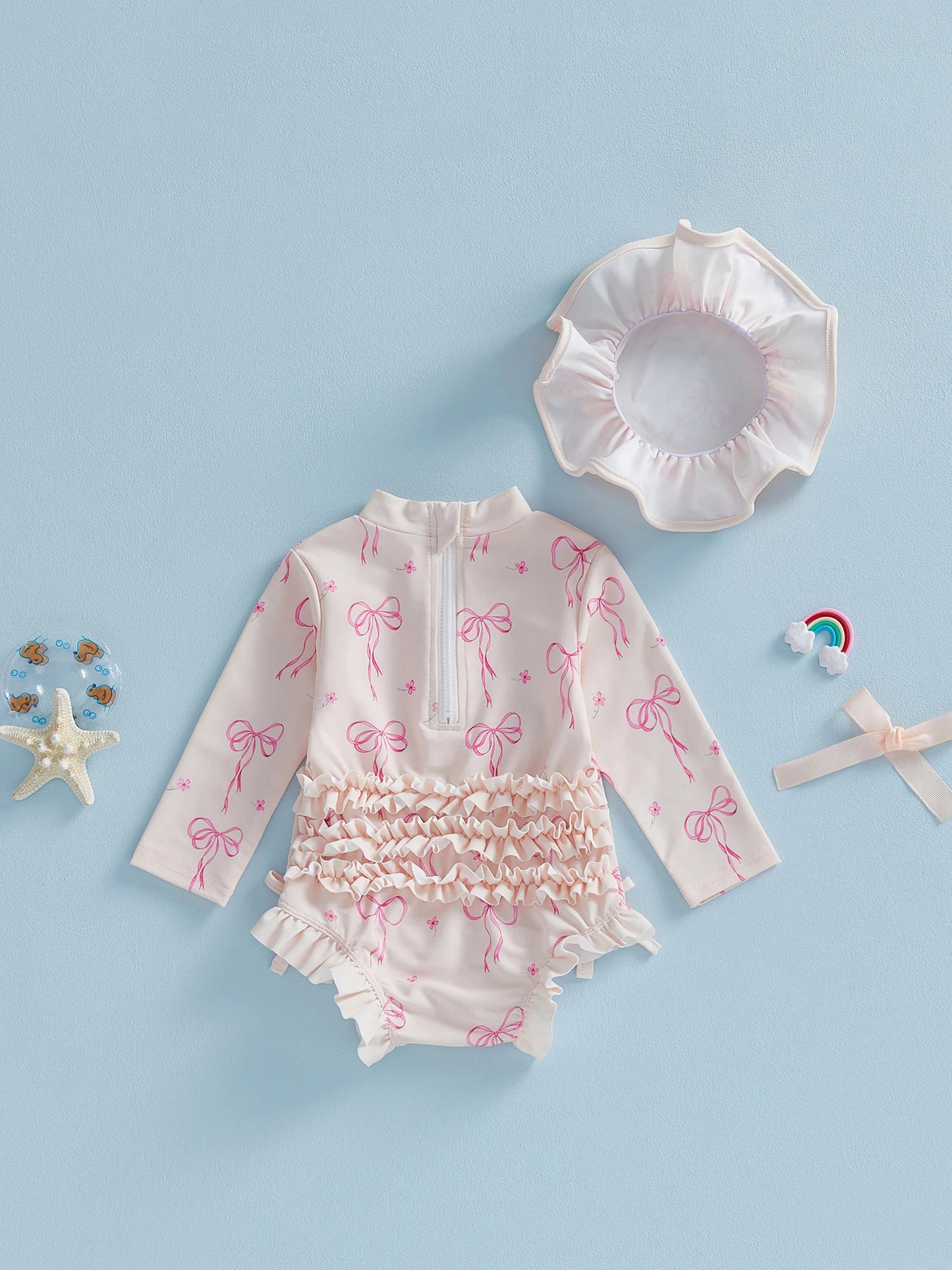 Maillot de bain pour bébé fille, protection contre les éruptions cutanées, imprimé nœud, à volants, manches longues, col rond, vêtements de plage, combinaison et chapeau, ensemble 2 pièces