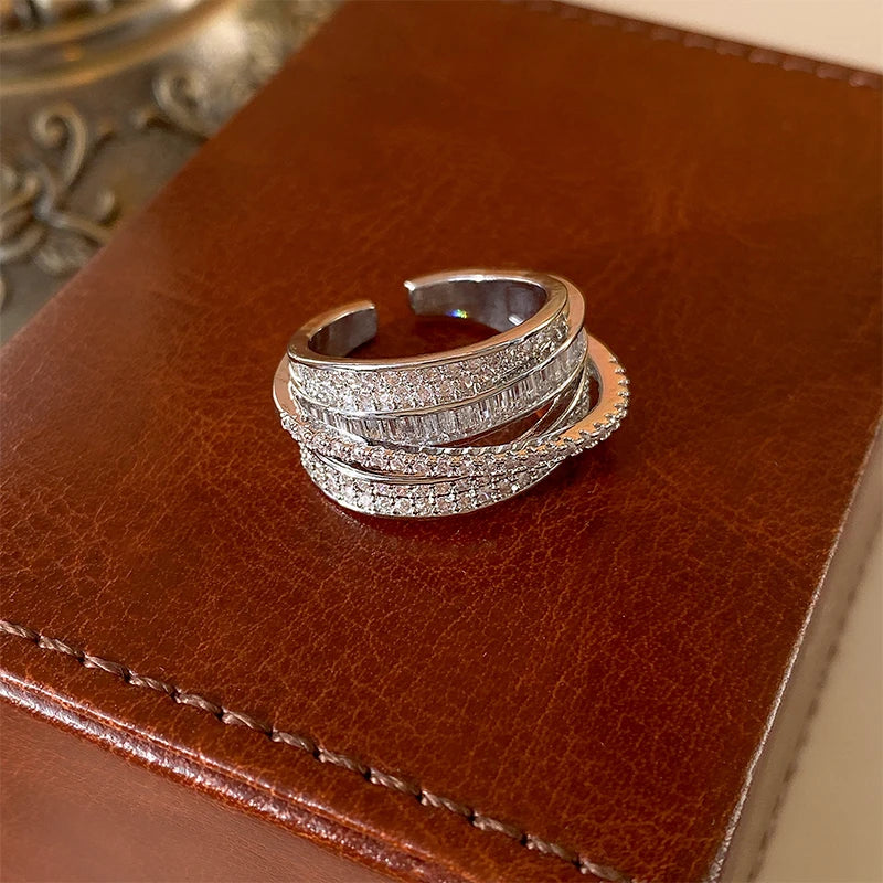 Bague en zircon cubique incrusté pour femmes — anneau ouvert, design croisé classique, bijoux de mariée, fiançailles, mariage