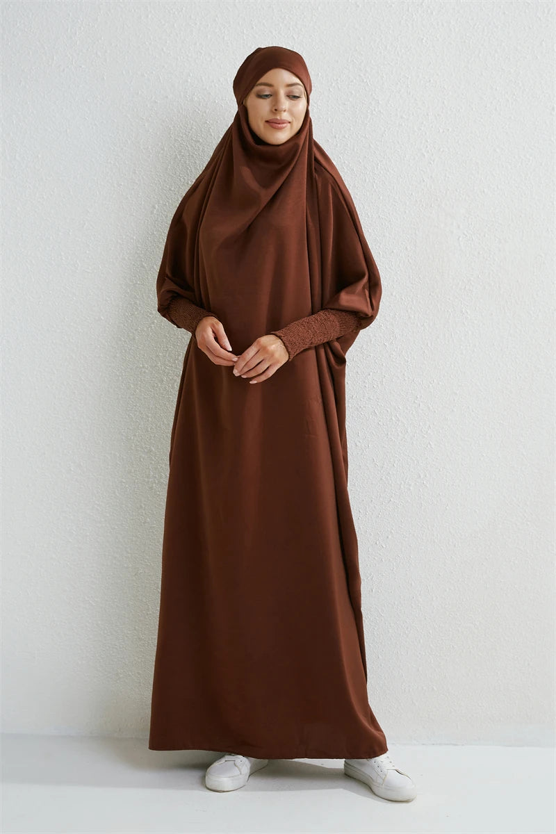 Abaya musulman à capuche manches smockées une pièce Robe de prière femmes Jilbab vêtements islamiques dubaï saoudien Robe noire modestie turque