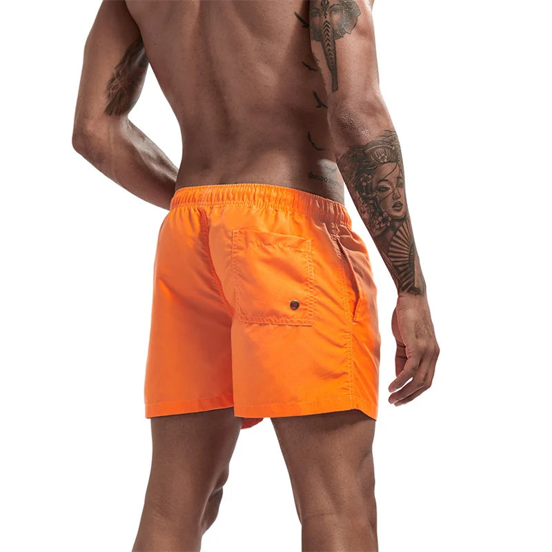 Maillot de bain pour hommes avec doublure en maille poches latérales short de plage solide séchage rapide léger cordon de serrage short de bain maillot de bain d'été