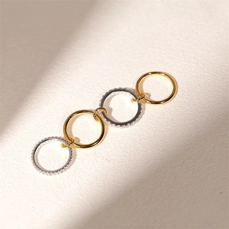 Une Niche bague de bijoux en cuivre bicolore à quatre anneaux, hypoallergénique, Style Ins, artefact empilable, adapté aux bijoux pour jeunes femmes