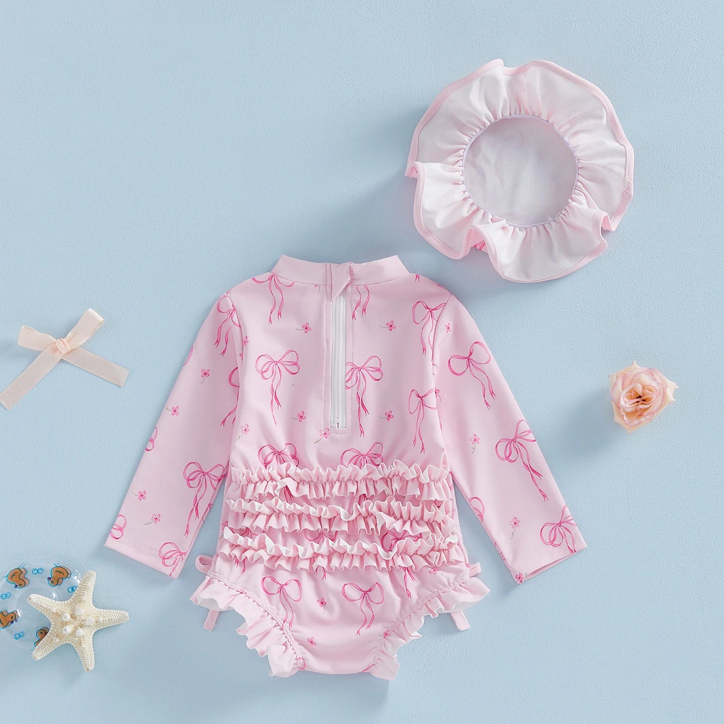 Maillot de bain pour bébé fille, protection contre les éruptions cutanées, imprimé nœud, à volants, manches longues, col rond, vêtements de plage, combinaison et chapeau, ensemble 2 pièces