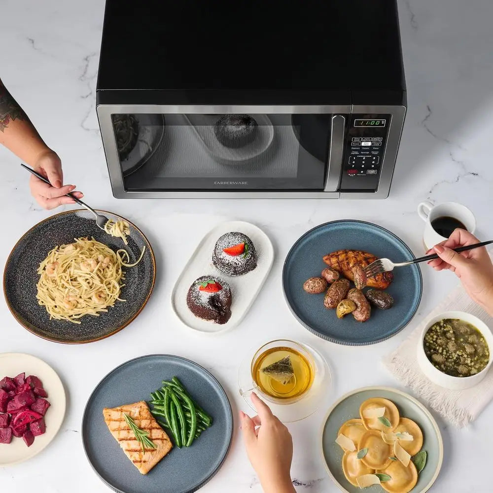 1.1 Cu. Ft. Countertop Microwave - 1000 Watts, Auto Cook, Roasting, Easy Clean, Child Safety Lock