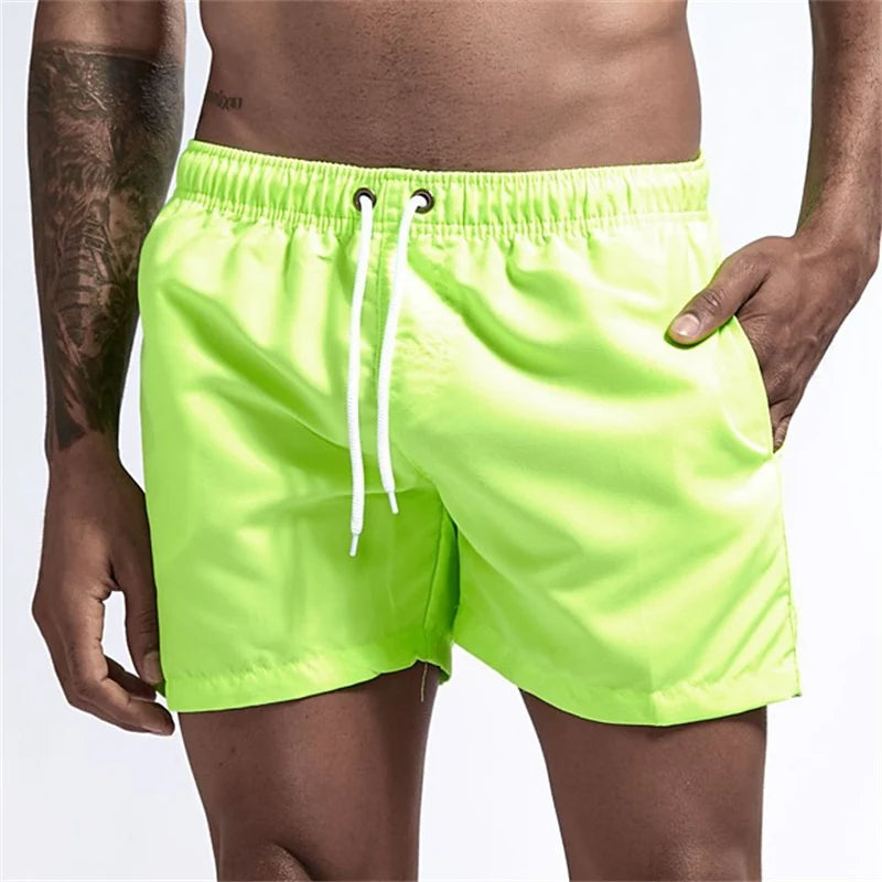 Maillot de bain pour hommes avec doublure en maille poches latérales short de plage solide séchage rapide léger cordon de serrage short de bain maillot de bain d'été