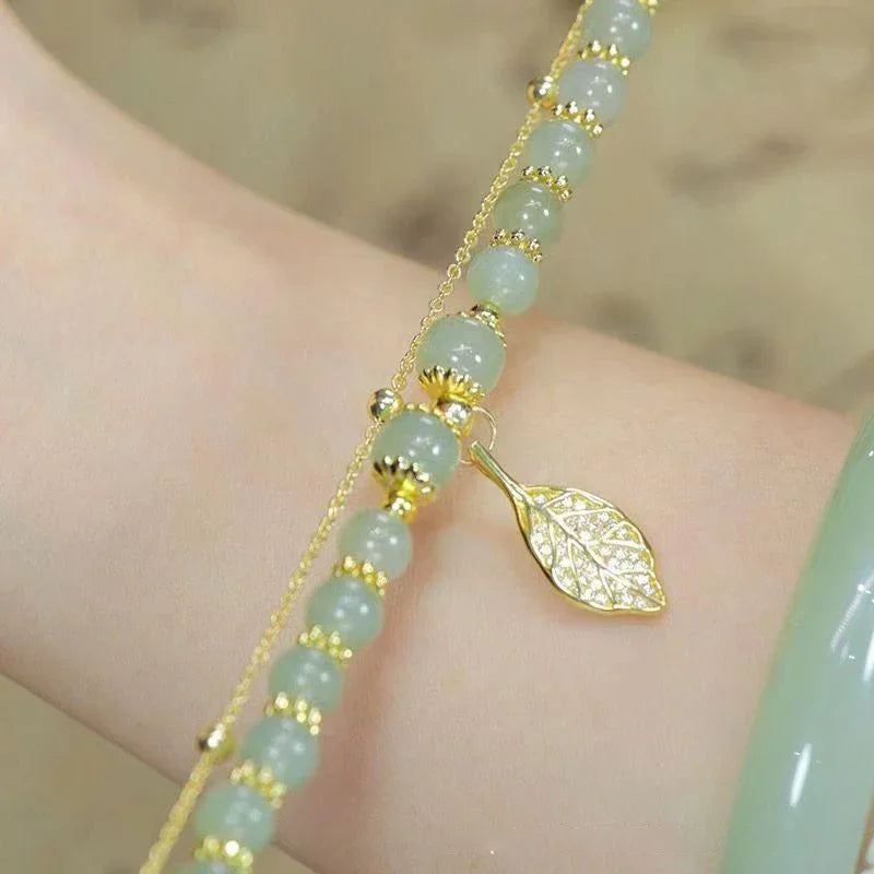 Pulsera de Jade verde de estilo chino para mujer, exquisita pulsera de cadena doble con hojas de color dorado, regalos para niñas