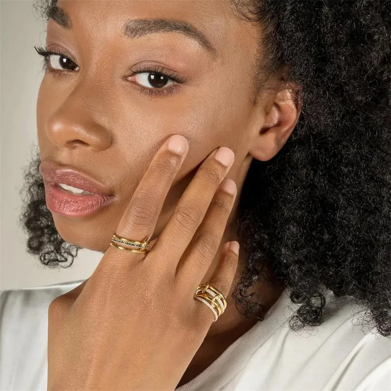 Une Niche bague de bijoux en cuivre bicolore à quatre anneaux, hypoallergénique, Style Ins, artefact empilable, adapté aux bijoux pour jeunes femmes
