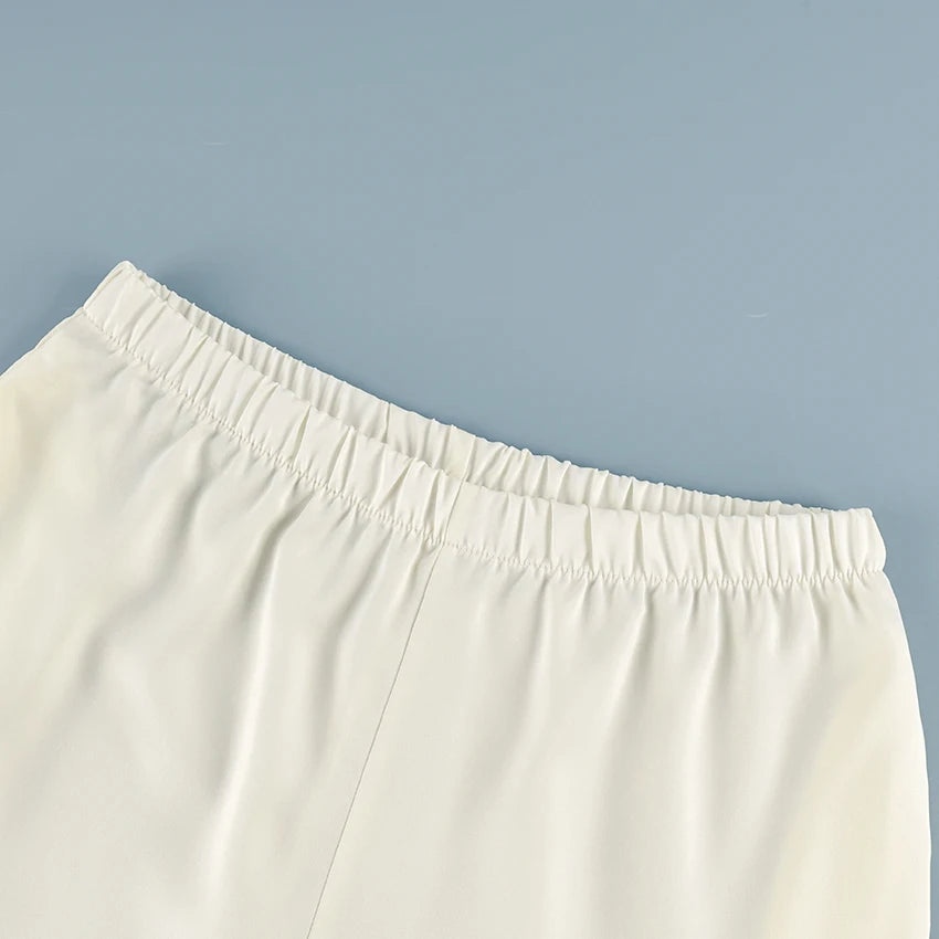 Pantalon ample en crêpe rose pour femme — rue chic, plissé, vintage, taille haute, 2025