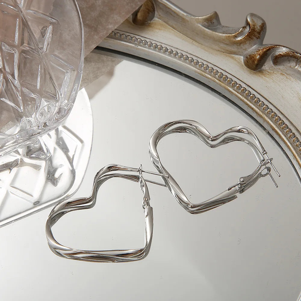 Boucles d'oreilles liquide irrégulières Y2K pour femmes, couleur argent, Hip-Hop Punk, mode géométrique, Clip pour fille, bijoux de fête tendance 2024