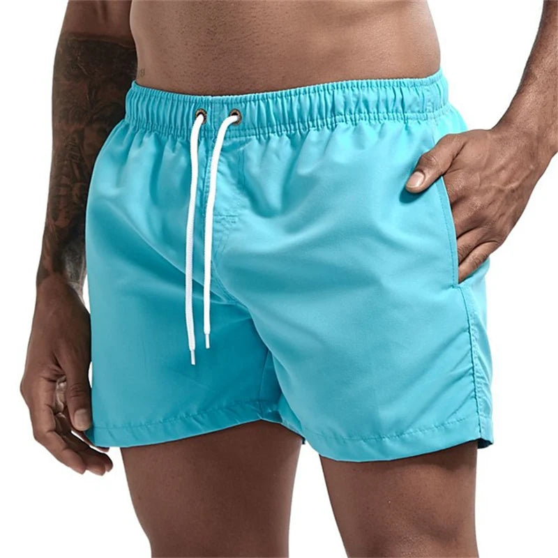 Maillot de bain pour hommes avec doublure en maille poches latérales short de plage solide séchage rapide léger cordon de serrage short de bain maillot de bain d'été